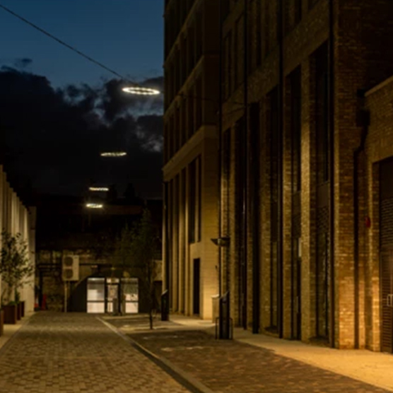Higgs Estate Higgs Estate in London, surrounded by stone brick housing developments illuminated by the NAVAR Pro in Catenary